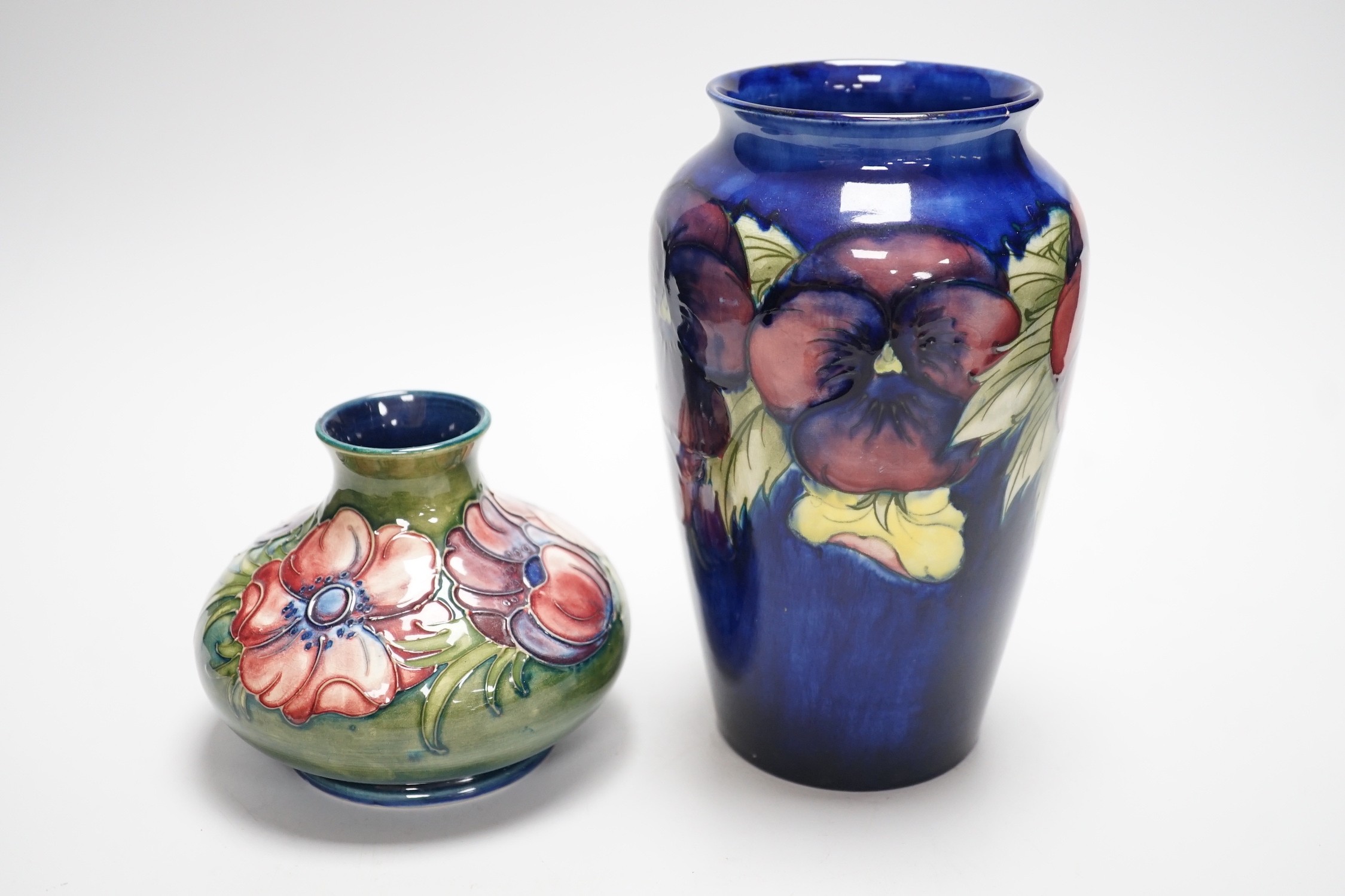 Two Moorcroft vases and a dish, tallest 20cm